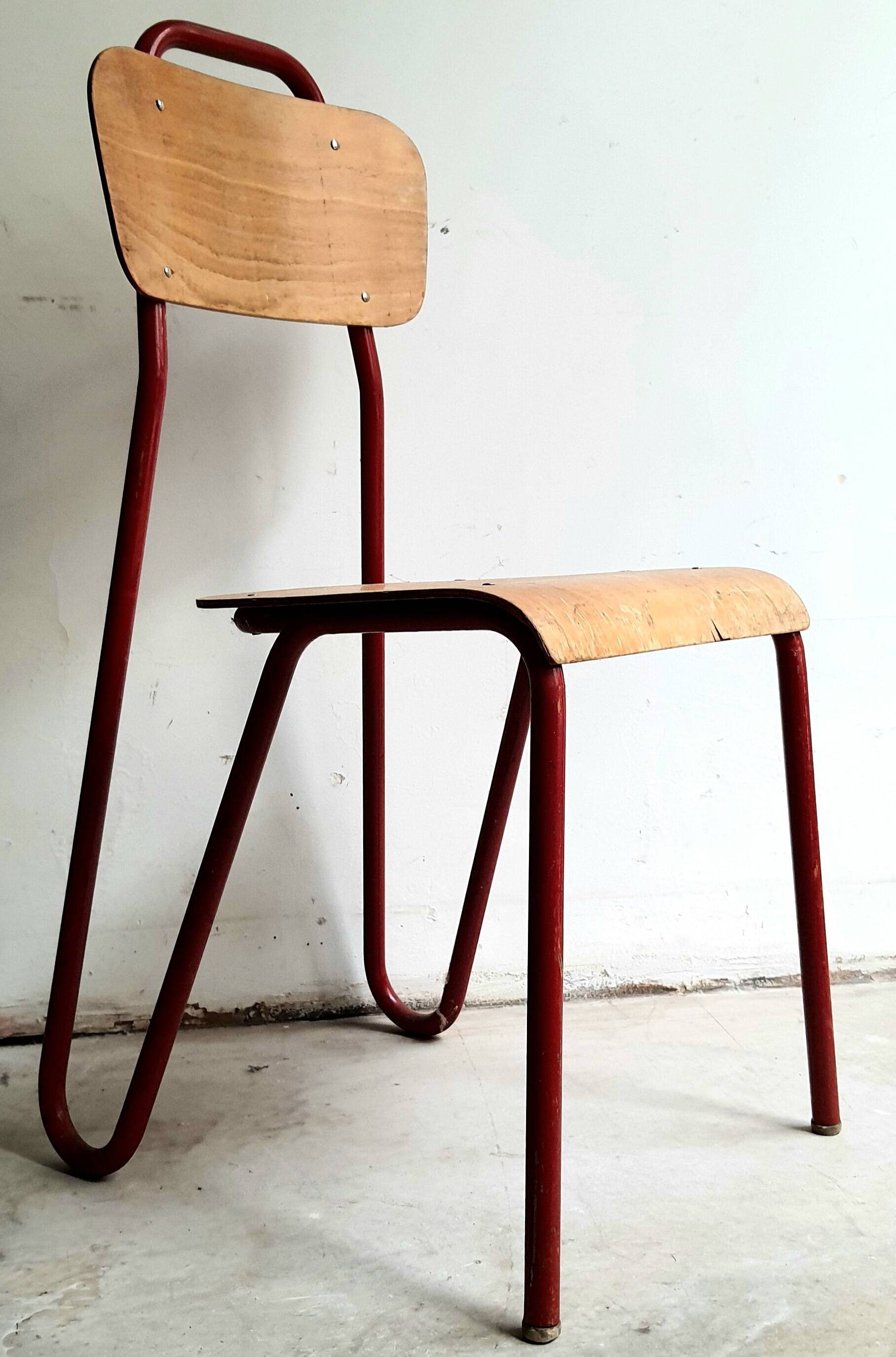 Rare pair of chairs in red tubular metal and wood  Vintage 1960