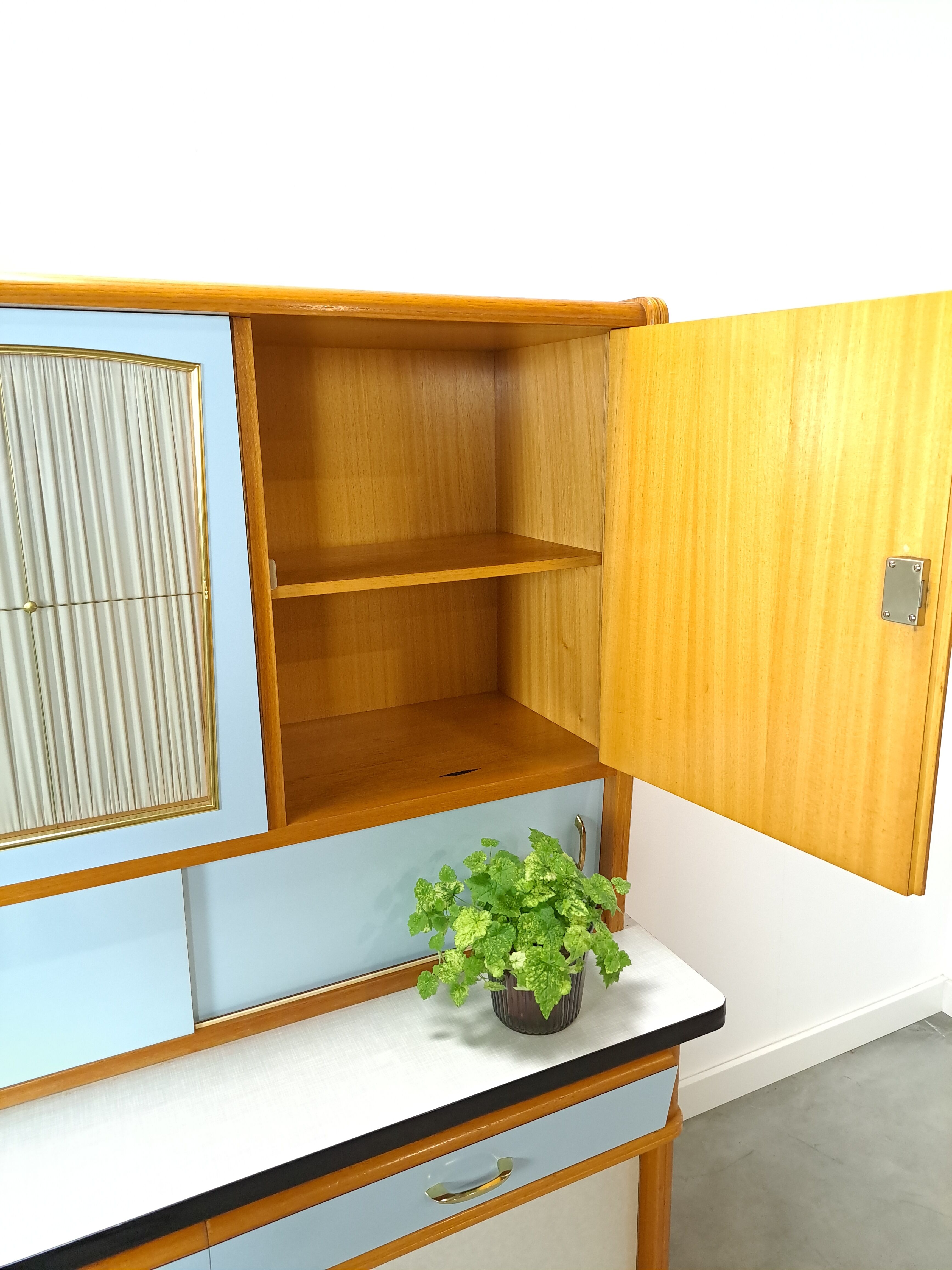 50s vintage kitchen cabinet with brass and formica