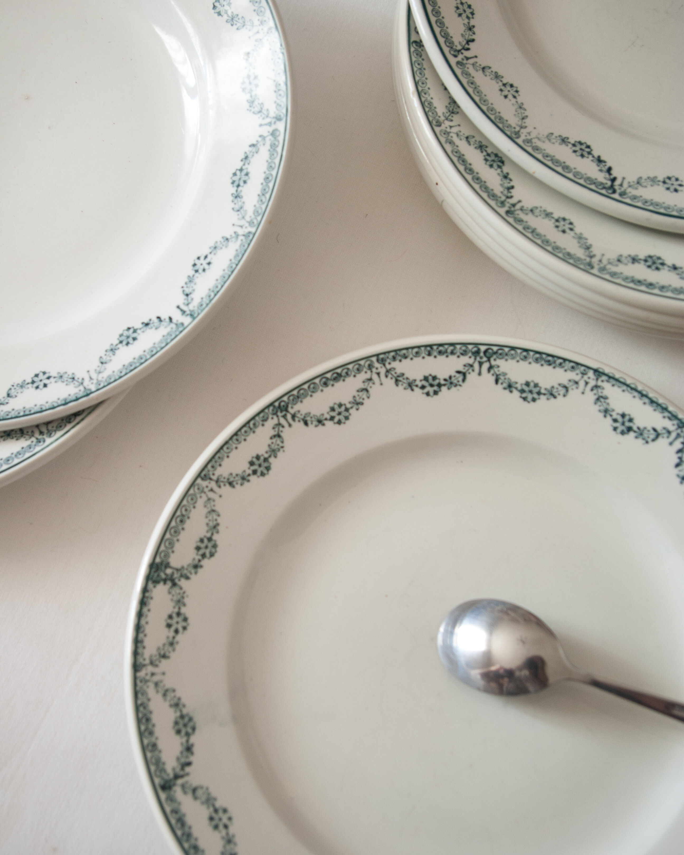 Old dessert plates, green flower decoration, iron earth