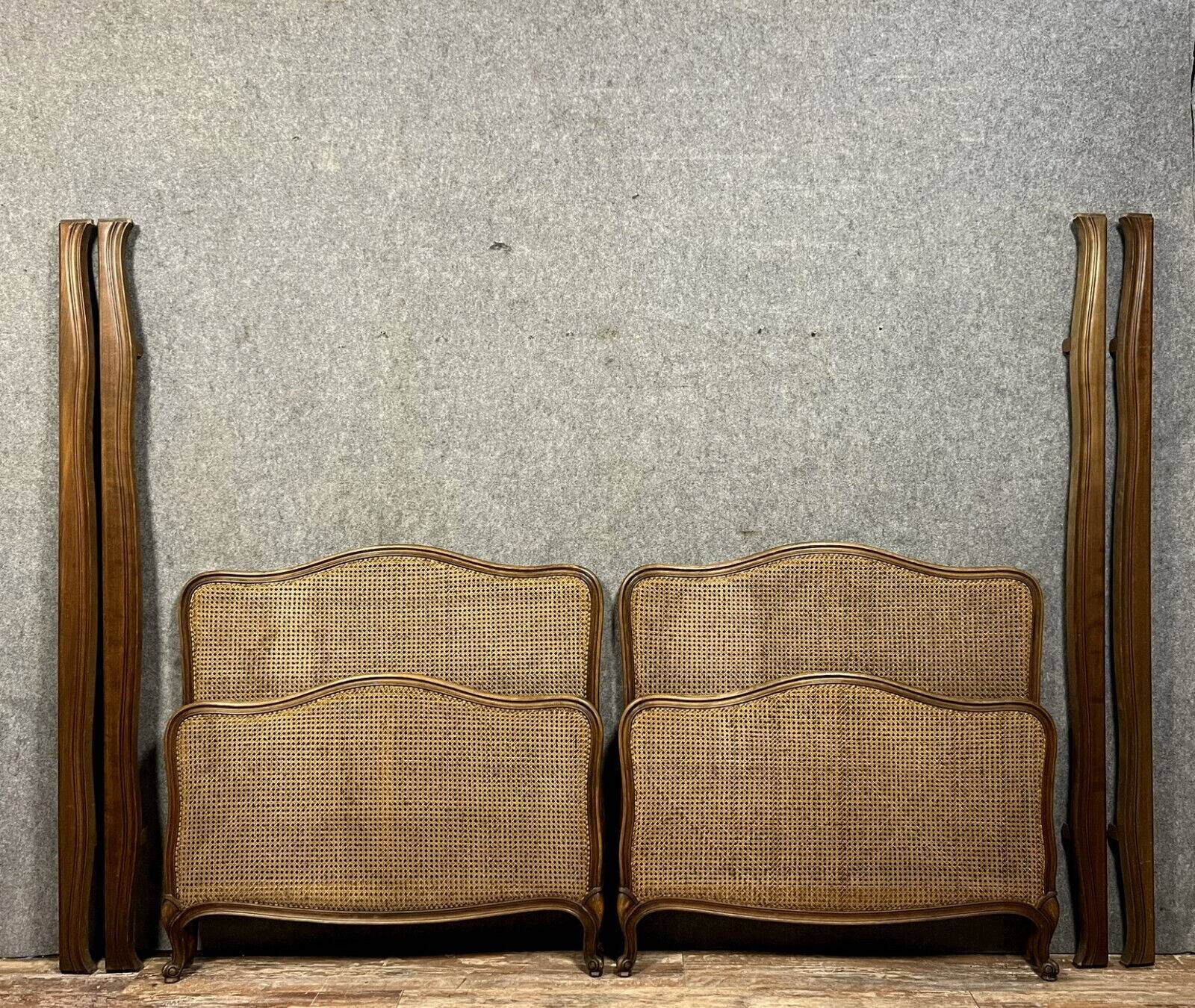 Pair of Louis XV style center beds in walnut and cane base circa 1900