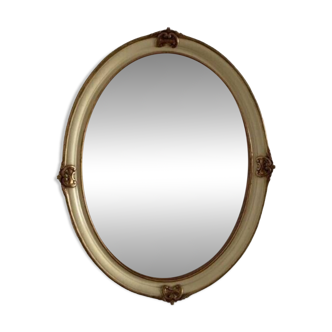 Mirror in wood and stucco with gilded highlights 20th century