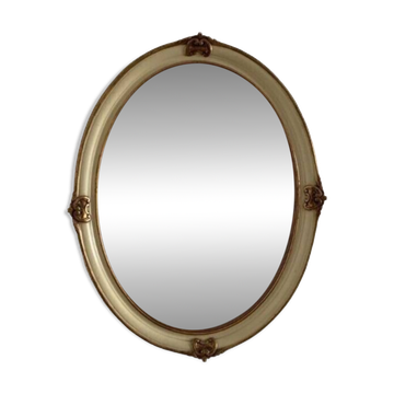 Mirror in wood and stucco with gilded highlights 20th century