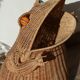 Wicker frog magazine rack by Olivier Cajan