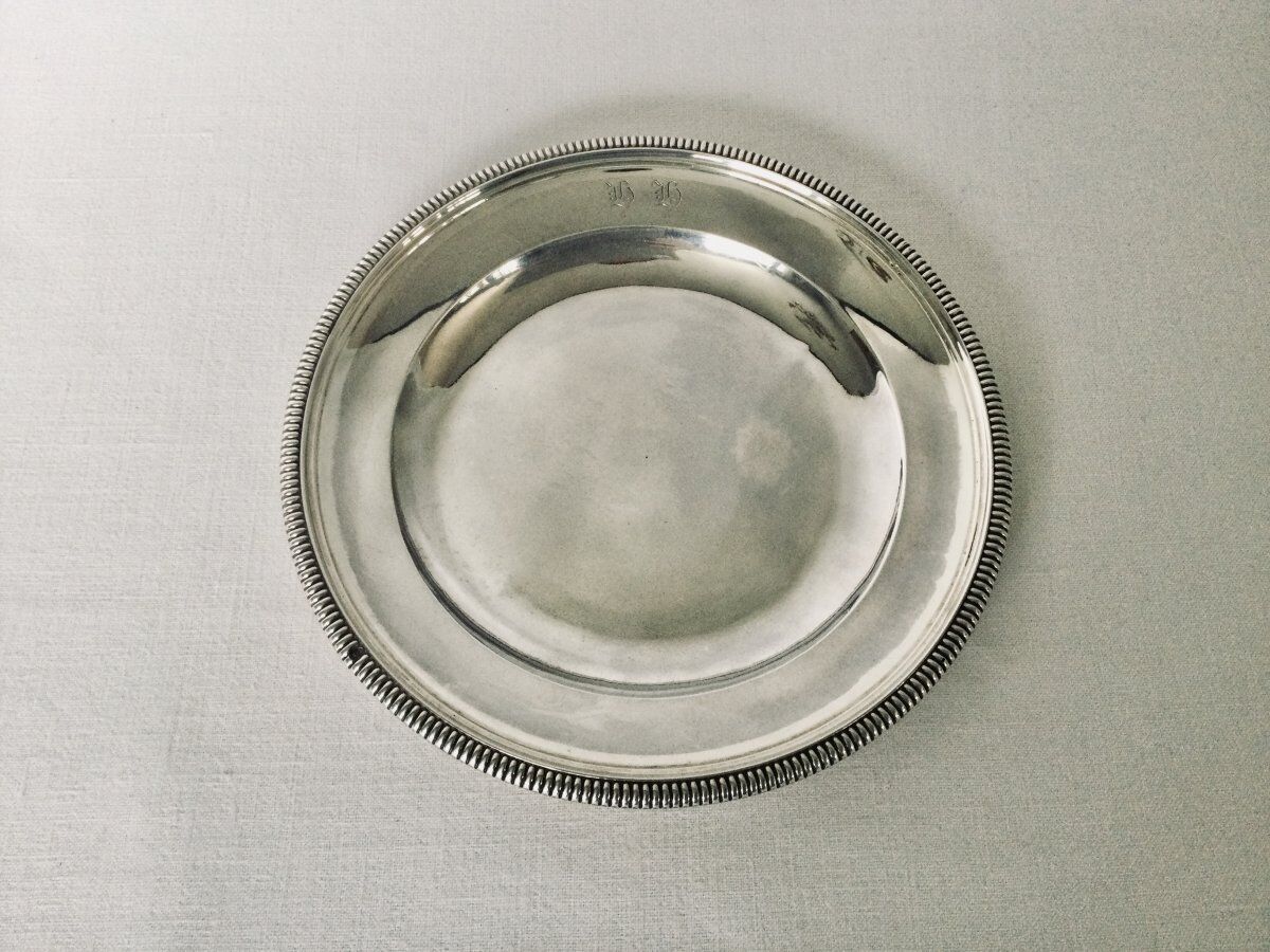 Solid silver dish with old man