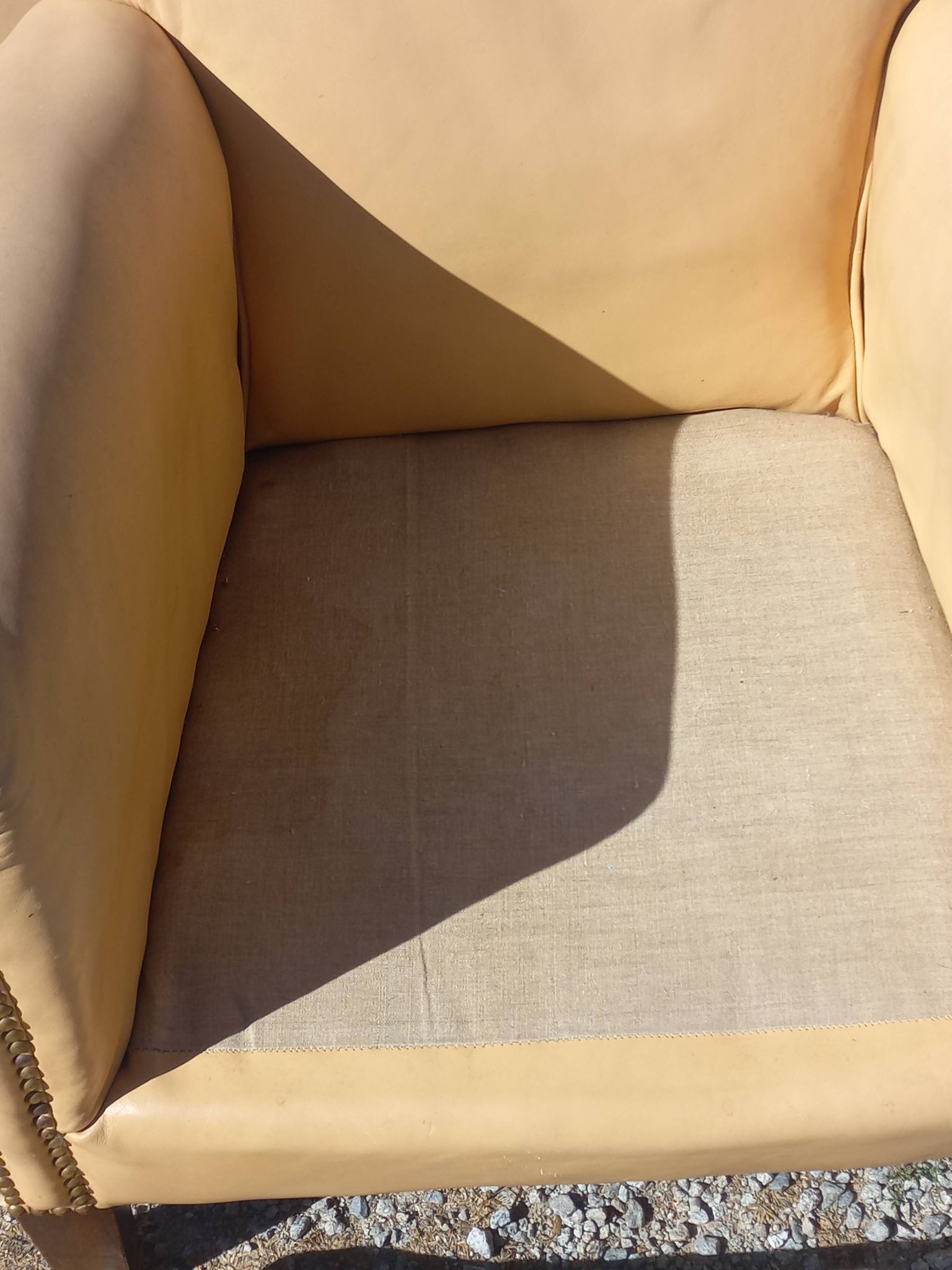 Pair of 1930s club armchairs in ivory leather.