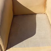 Pair of 1930s club armchairs in ivory leather.