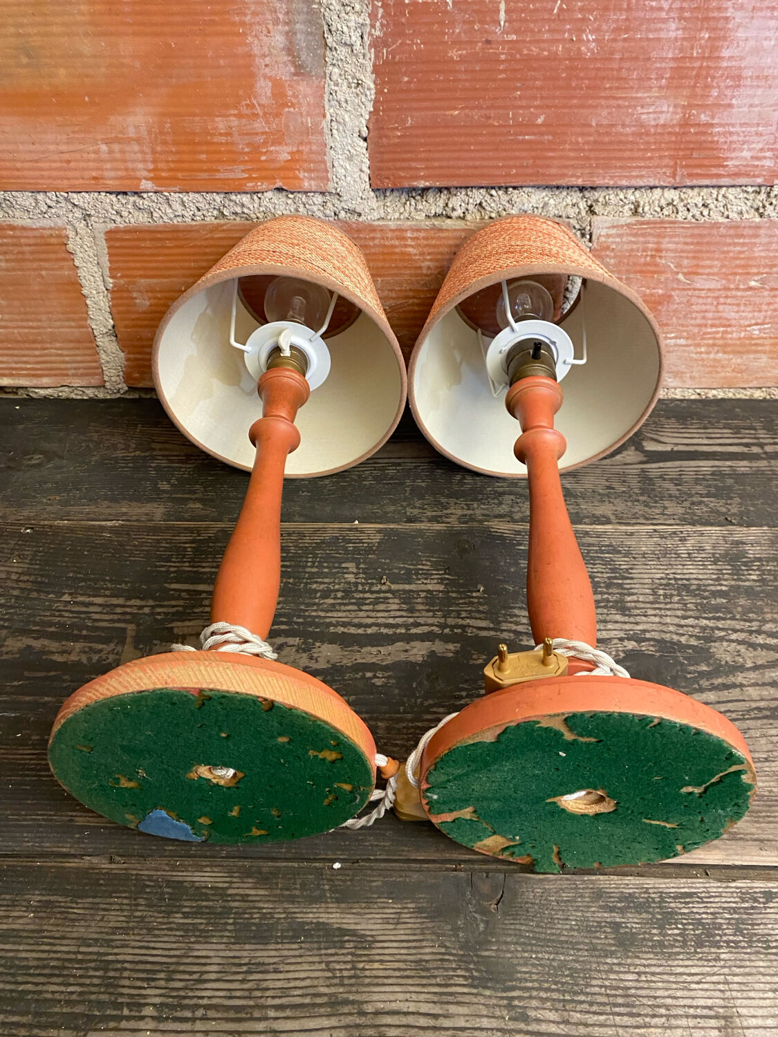 Pair of antique turned wood bedside lamps with push button switch