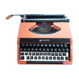 Machine à écrire orange vintage 1970
