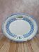 Vintage oval plate Bassano with blue floral relief decoration.