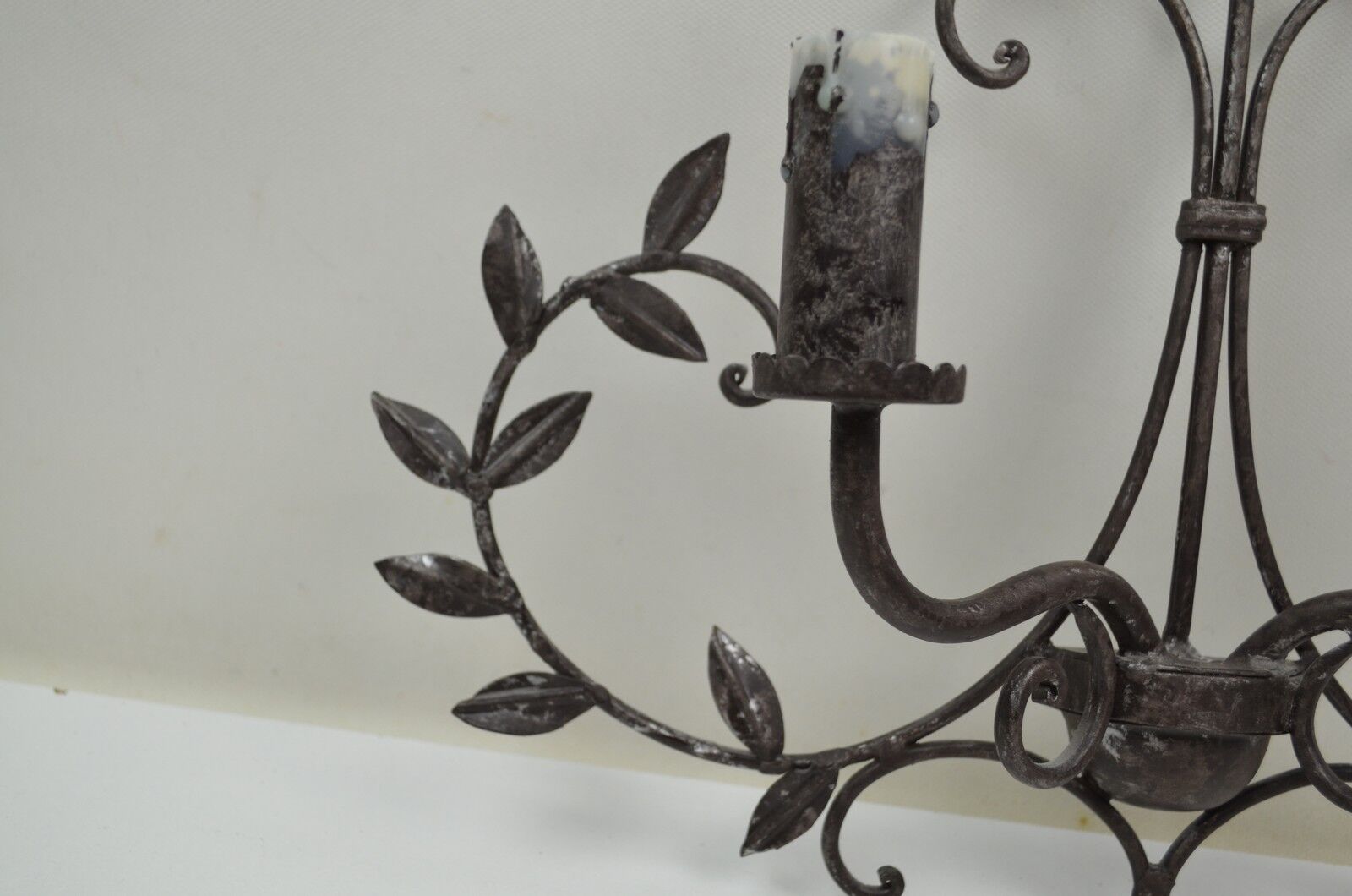 pair of grey patinated iron wall sconces