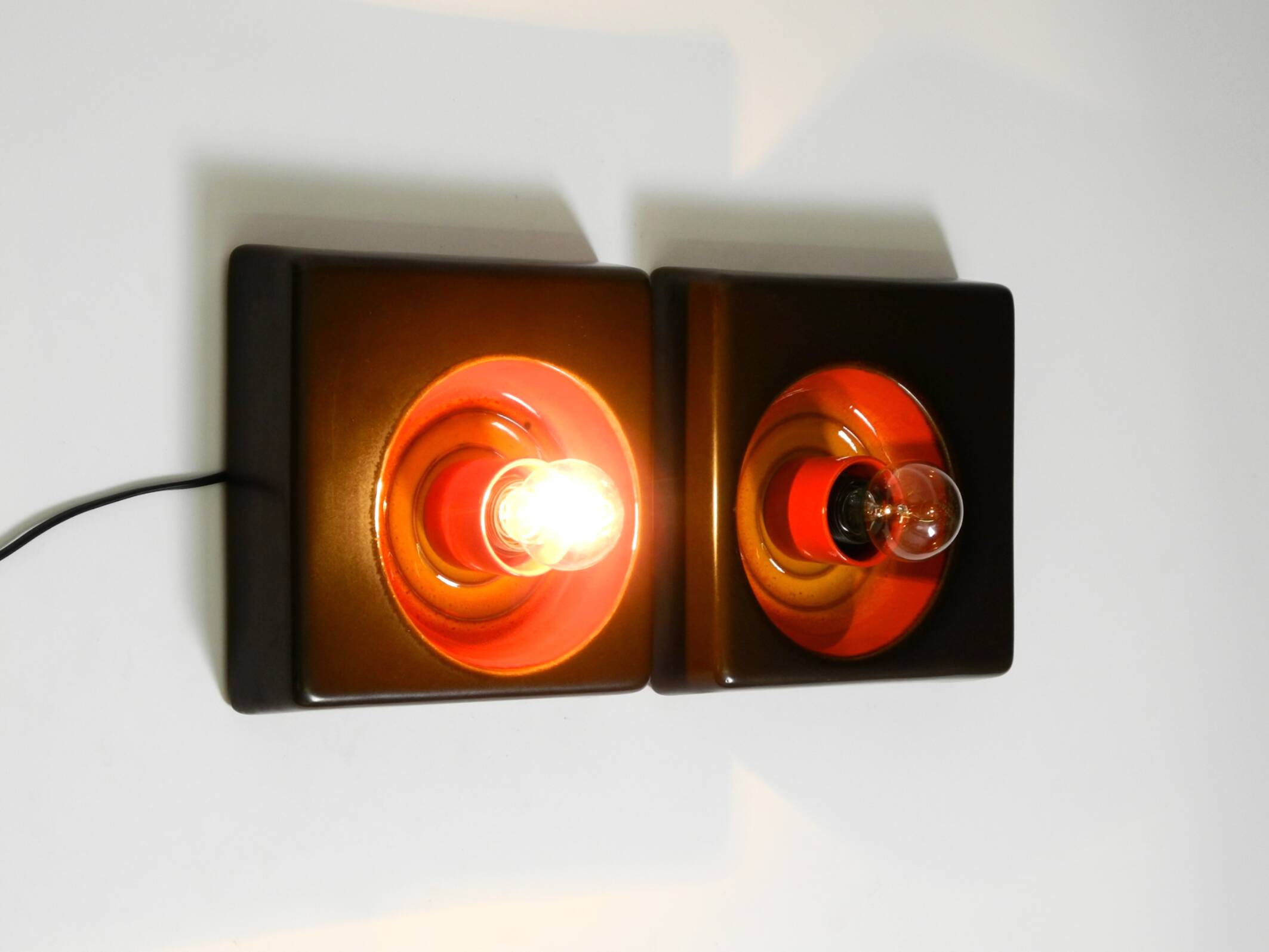 Two beautiful original 1970s Space Age ceramic wall lamps