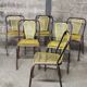 Six chaises en métal perforé seducta René Malaval