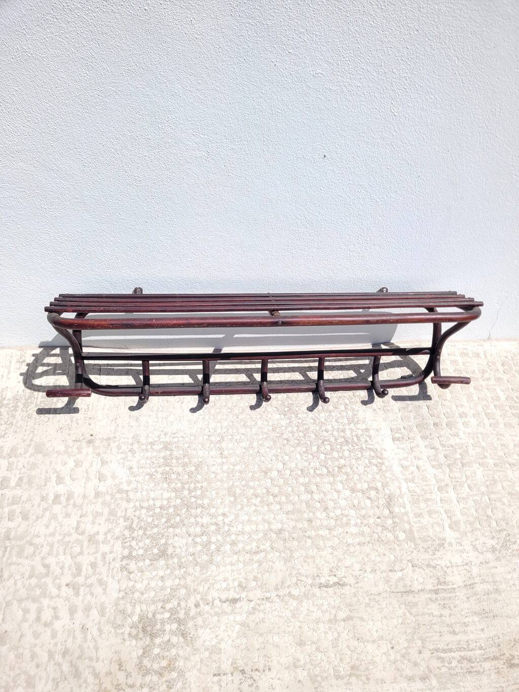 Old wooden cloakroom coat rack
