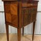 Side table with a faux book front.