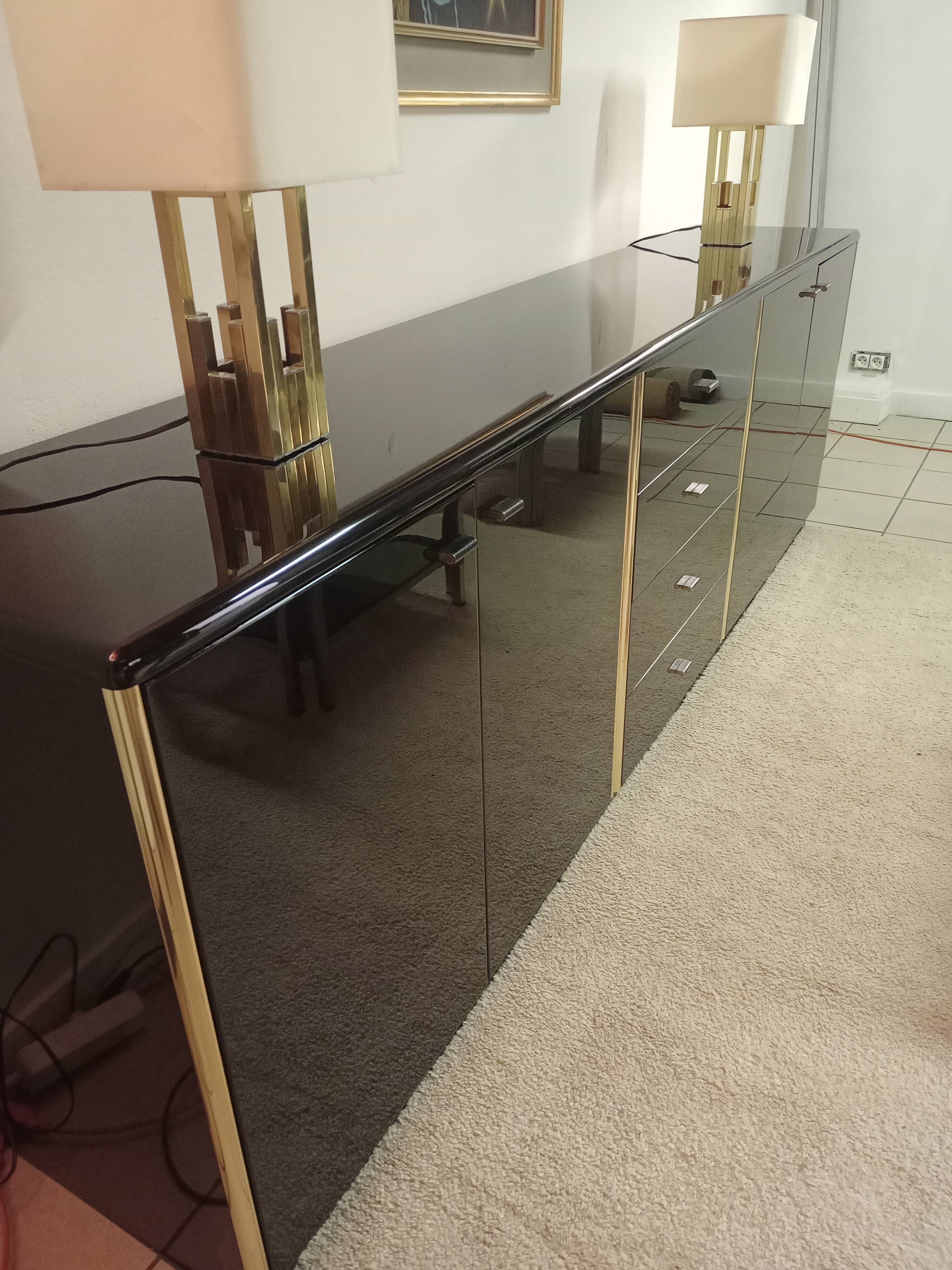 Black lacquered and brass design 70/80