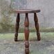 Turned wooden tripod stool