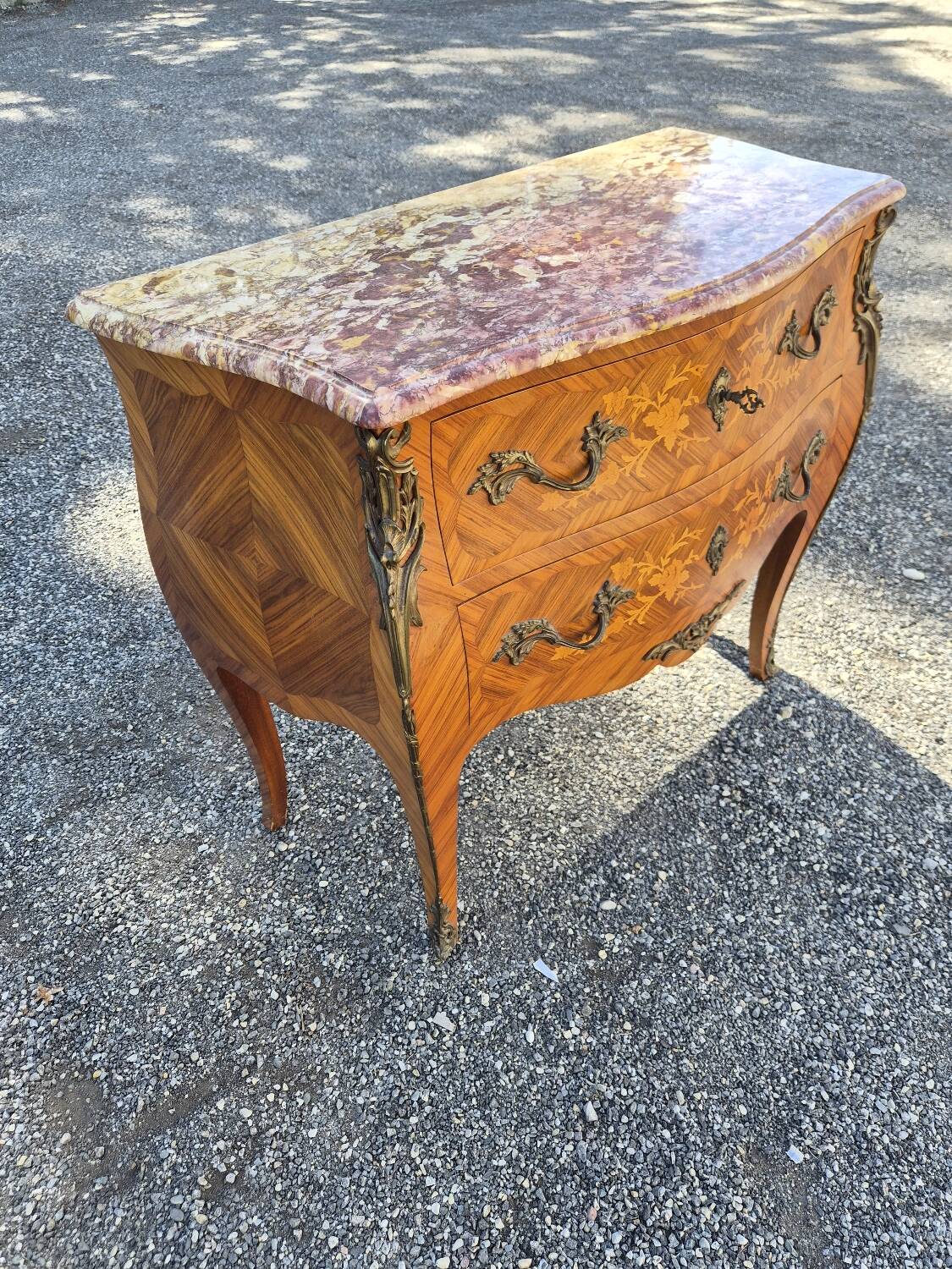 Louis XV style jump commode with marquetry and marble decoration.