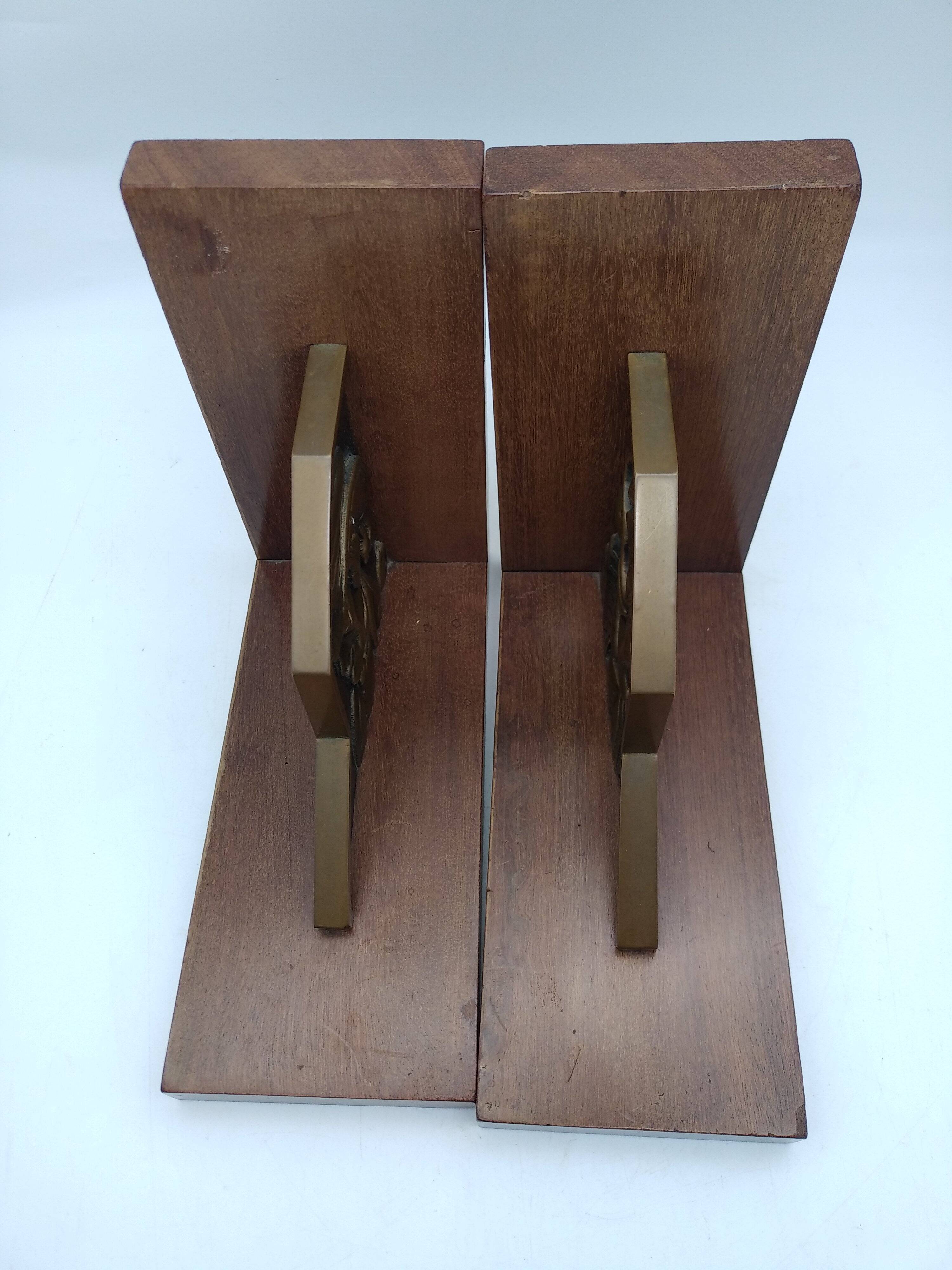 Pair of Breton couple bookends in bronze and wood.