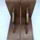Pair of Breton couple bookends in bronze and wood.
