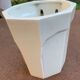 Wall-mounted cache-pot in white porcelain