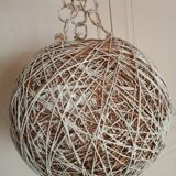 Globe suspension made of twine and wicker