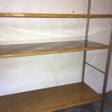 set of two 1960 vintage metal thong shelves.