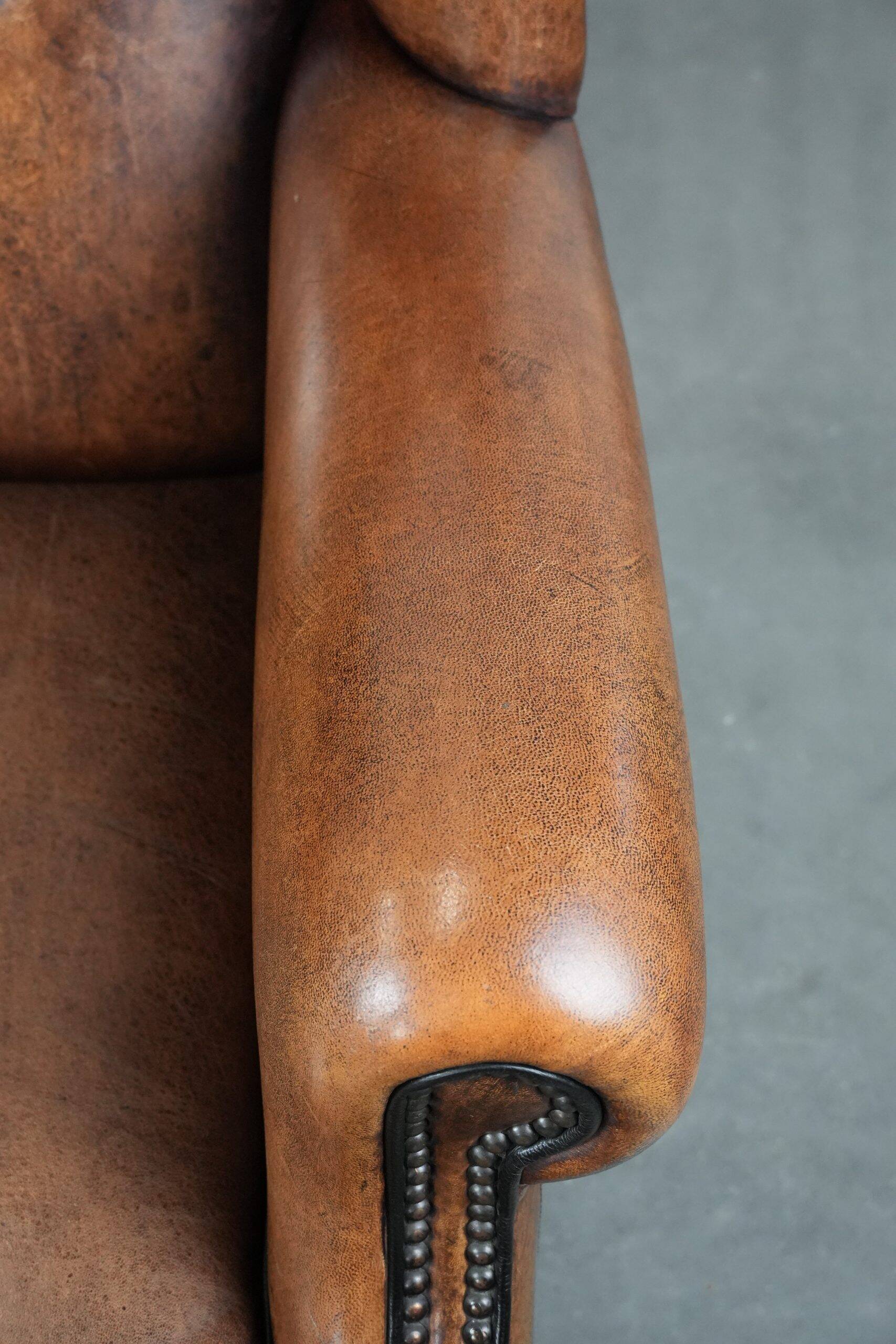 Timeless sheepskin wingback armchair with beautiful colours