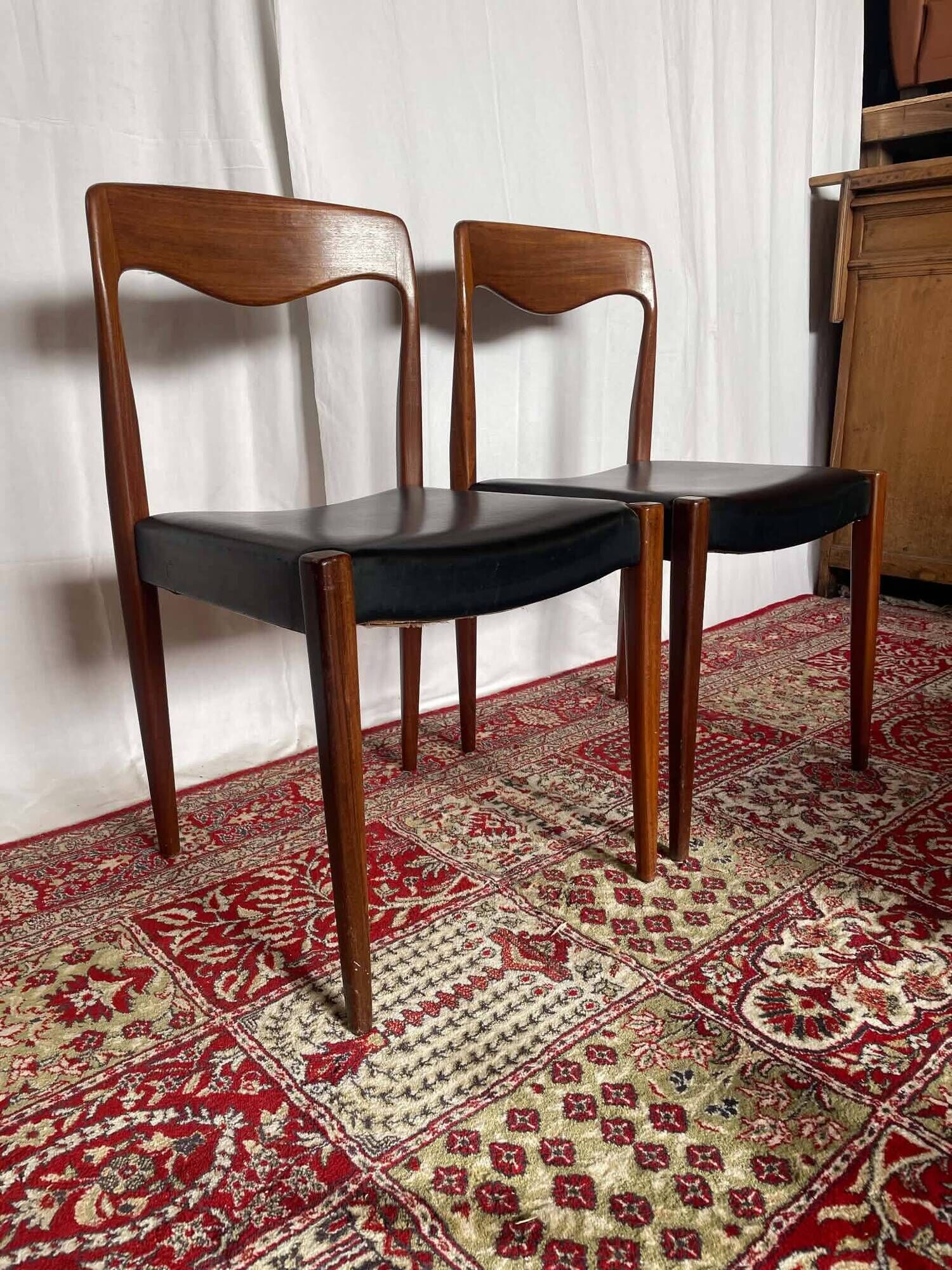 Pair of vintage teak chairs with black faux leather – Scandinavian style