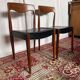Pair of vintage teak chairs with black faux leather – Scandinavian style
