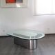 Vintage coffee table with glass and chrome metal.