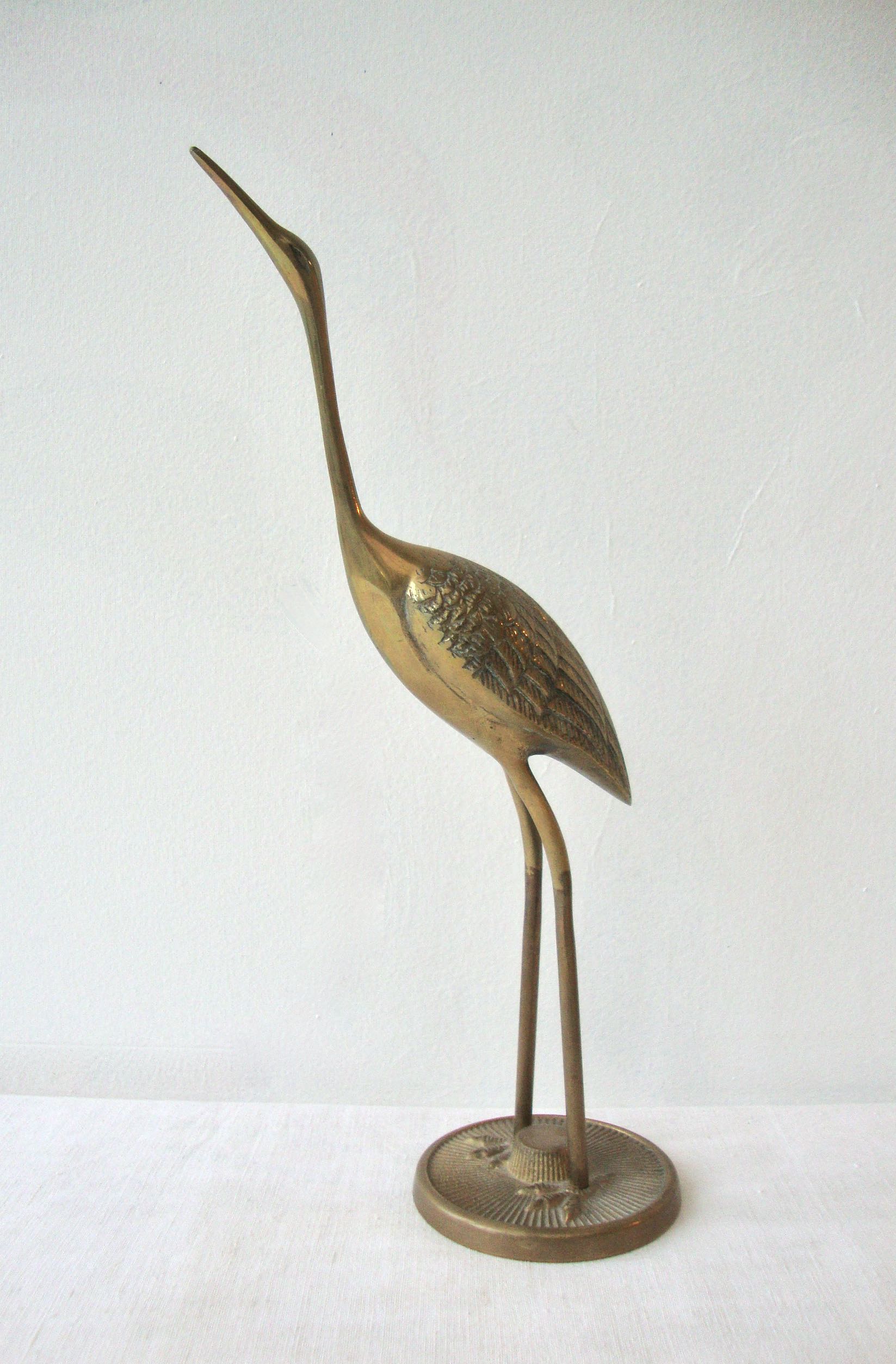 Brass heron