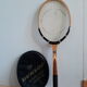 Wooden Dunlop tennis racket with its cover