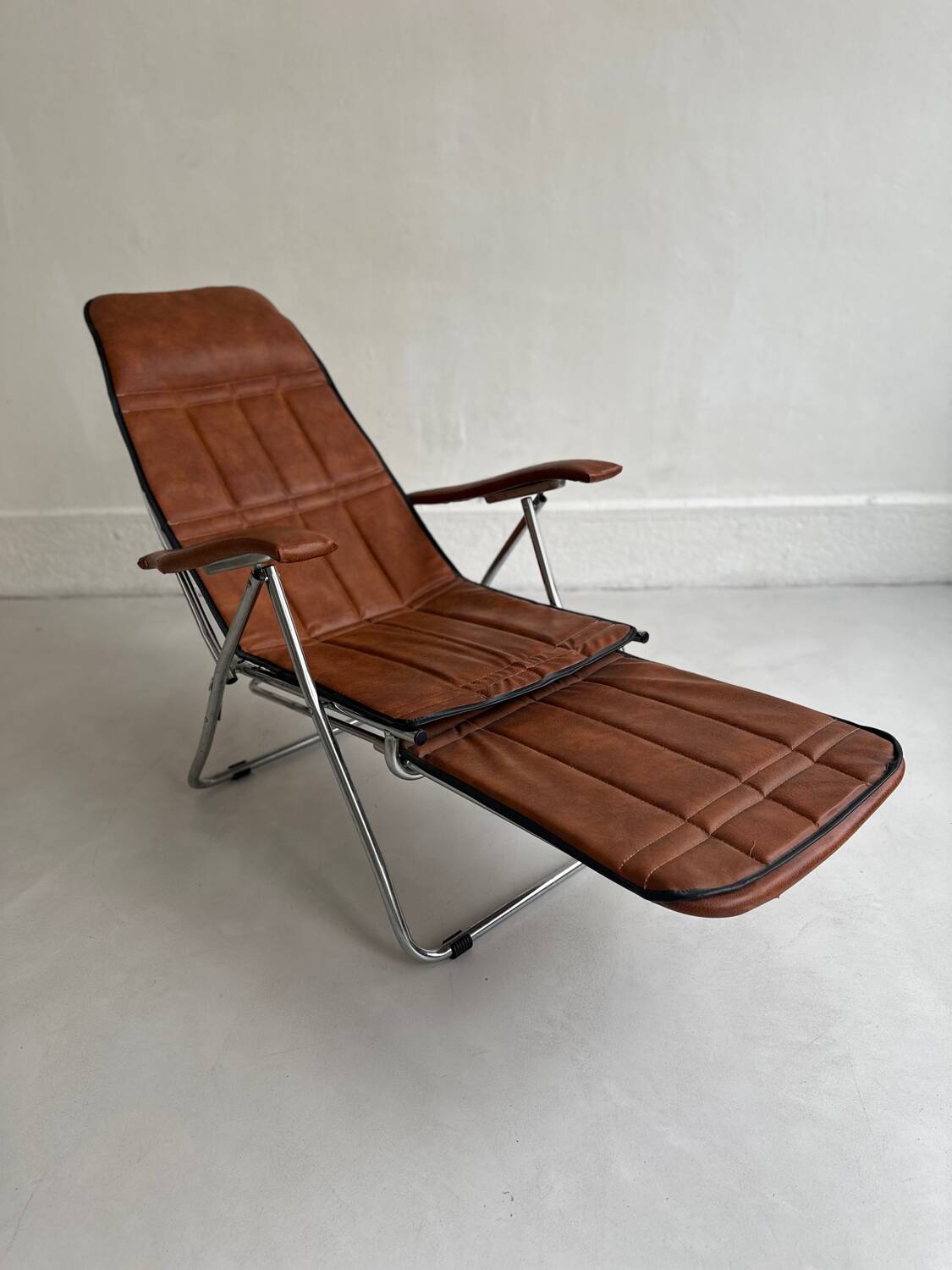 Authentic vintage reclining armchair