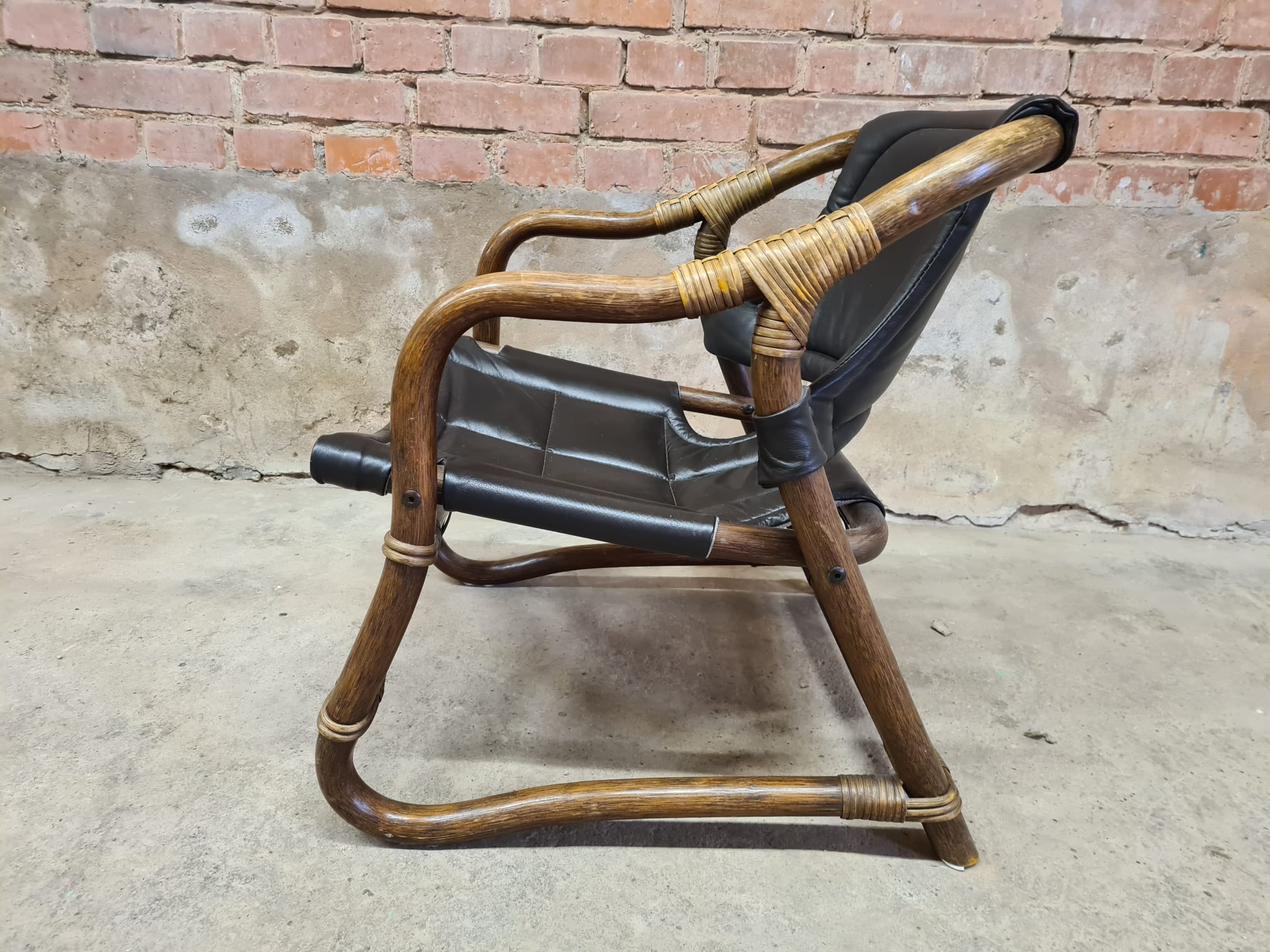 Pair of vintage skaï bamboo armchairs