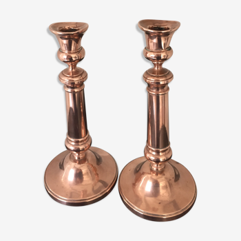 Pair of pink copper candlesticks