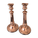 Pair of pink copper candlesticks
