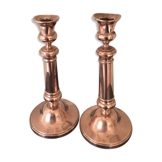 Pair of pink copper candlesticks