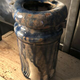 Enamelled pottery vase signed