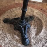 Marble side table with a cast iron base.