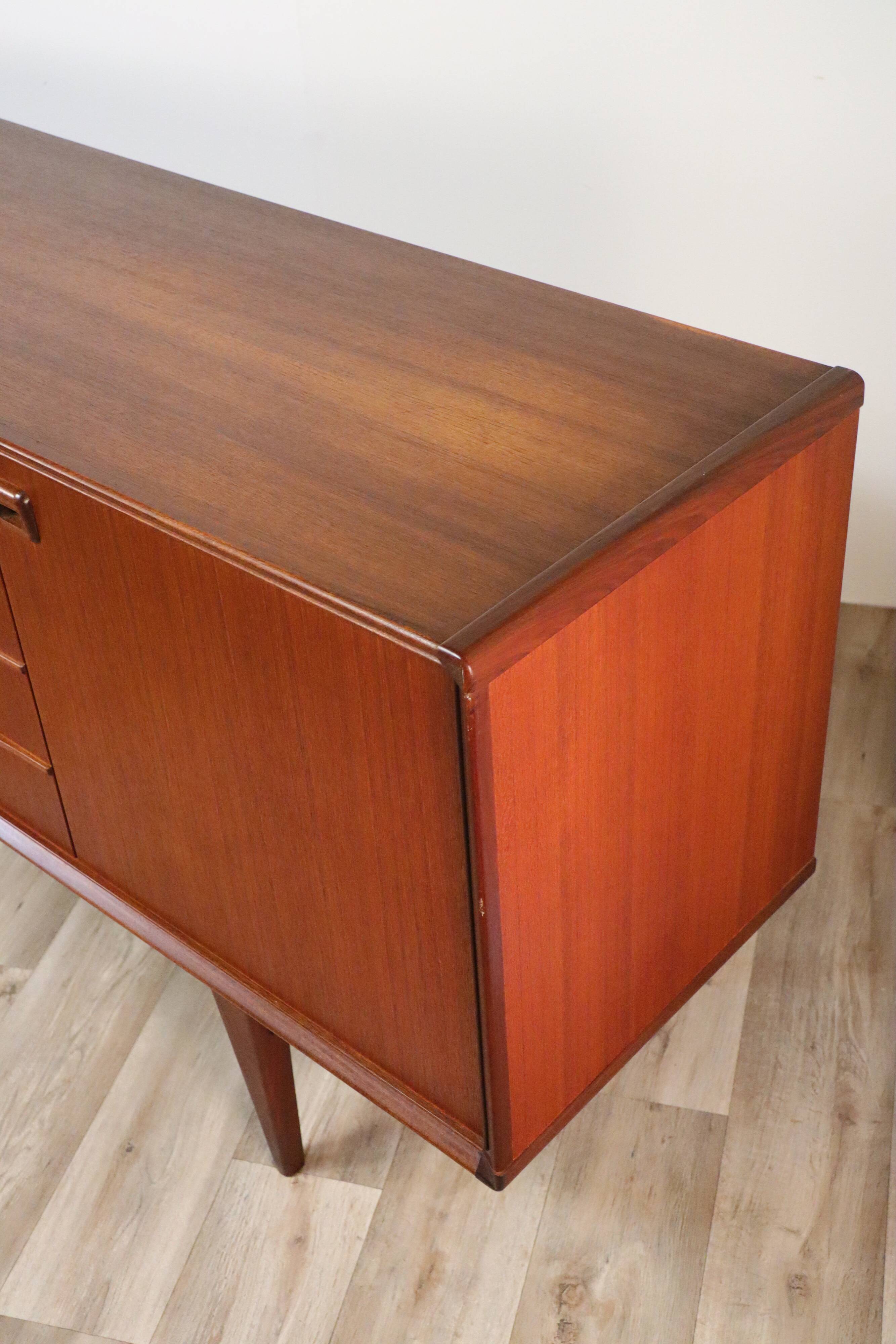 Scandinavian row in solid teak 1960