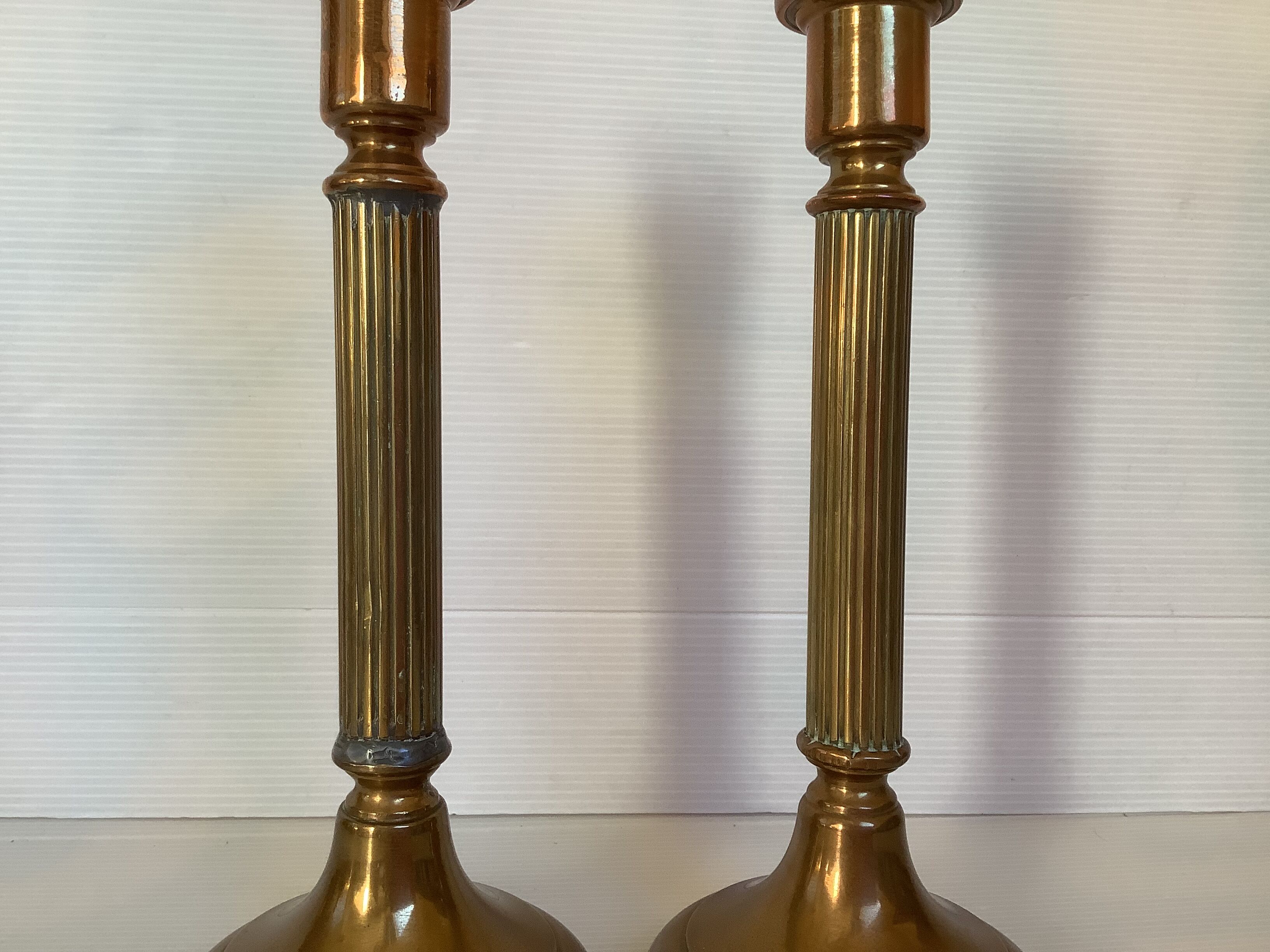 Pair of old brass candle holders