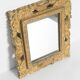 Decorative gold mirror mid-century in a wooden frame, Italy, 1960s.