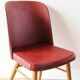 Chaise en skai rouge, pieds compas, années 60