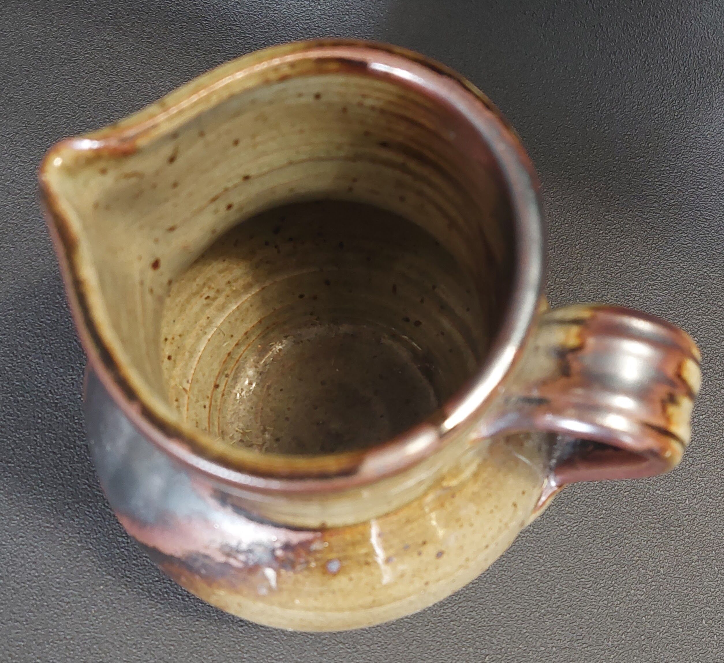 Glazed terracotta pitcher from the 20th century.