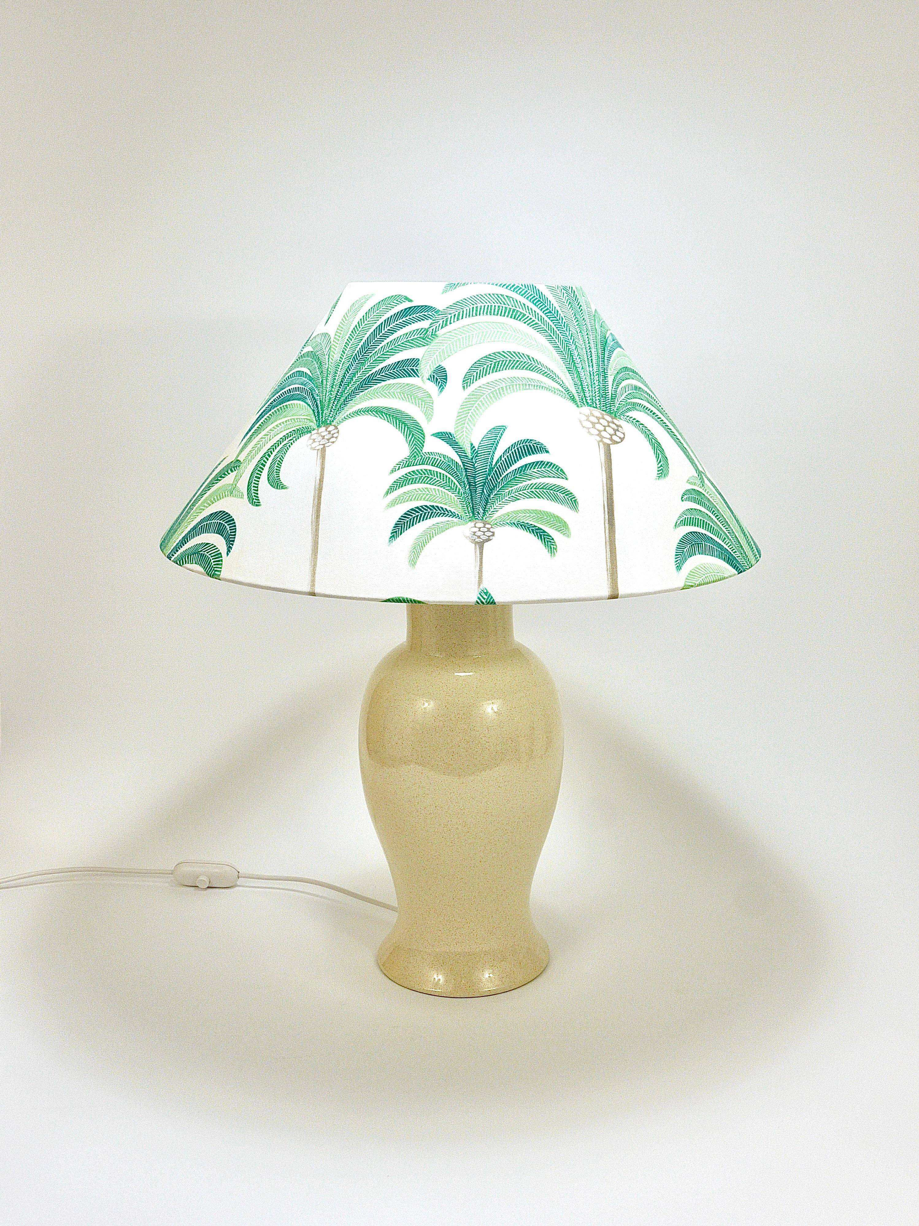 Pair of Tommaso Barbi Riviera palm tree table lamps from the 1970s with matching cushions.