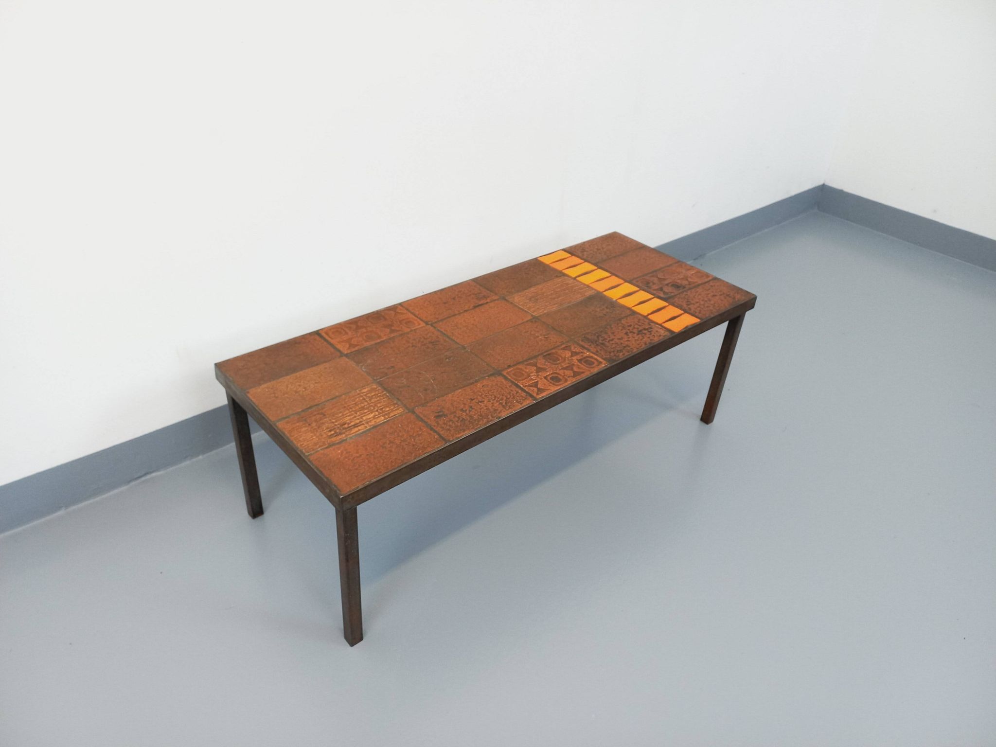 Vintage rectangular coffee table by Jean Jaffeux in steel and ceramic from the 60s