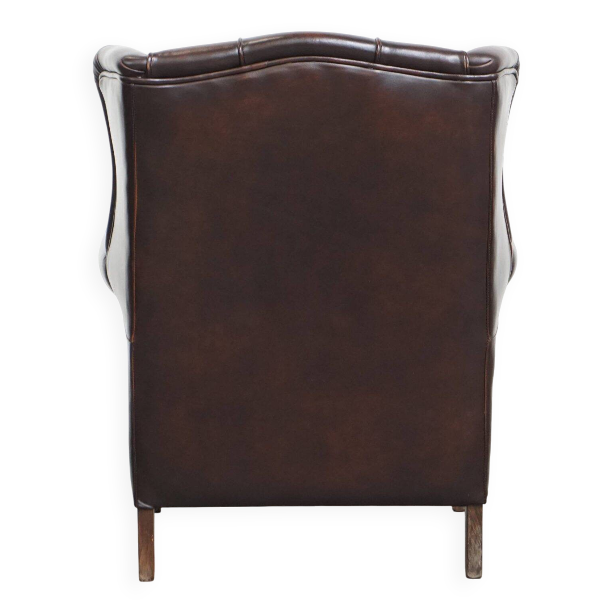 Very beautiful wing chair made of cowhide leather in English style