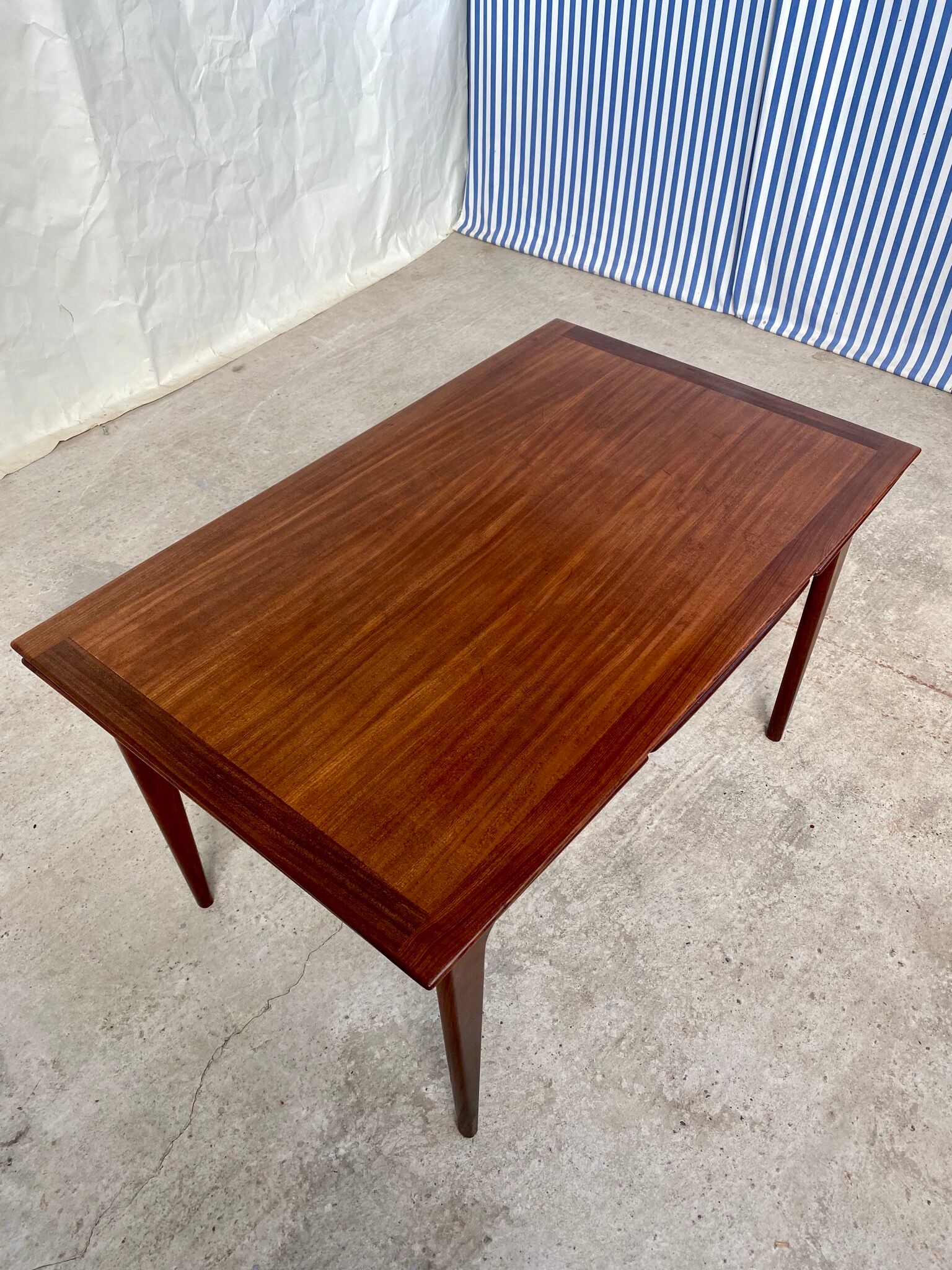 Teak extending dining table by Younger