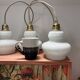 Lot de trois suspensions scandinaves en opaline blanche