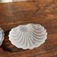 Vintage silver-plated shell butter dish with transparent bowl.